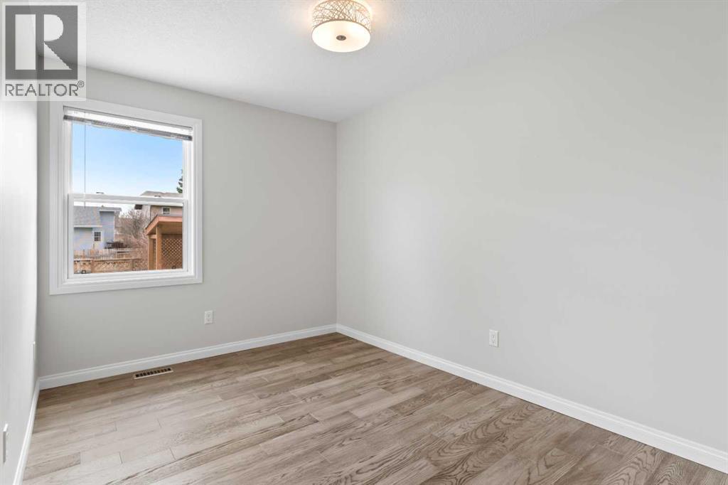 36 Woodfern Rise SW, Calgary, Alberta  T2W 4S2 - Photo 21 - A2305683