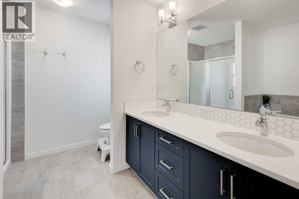 76 Carringsby Avenue NW, Calgary, Alberta  T3P 1R9 - Photo 19 - A2306781