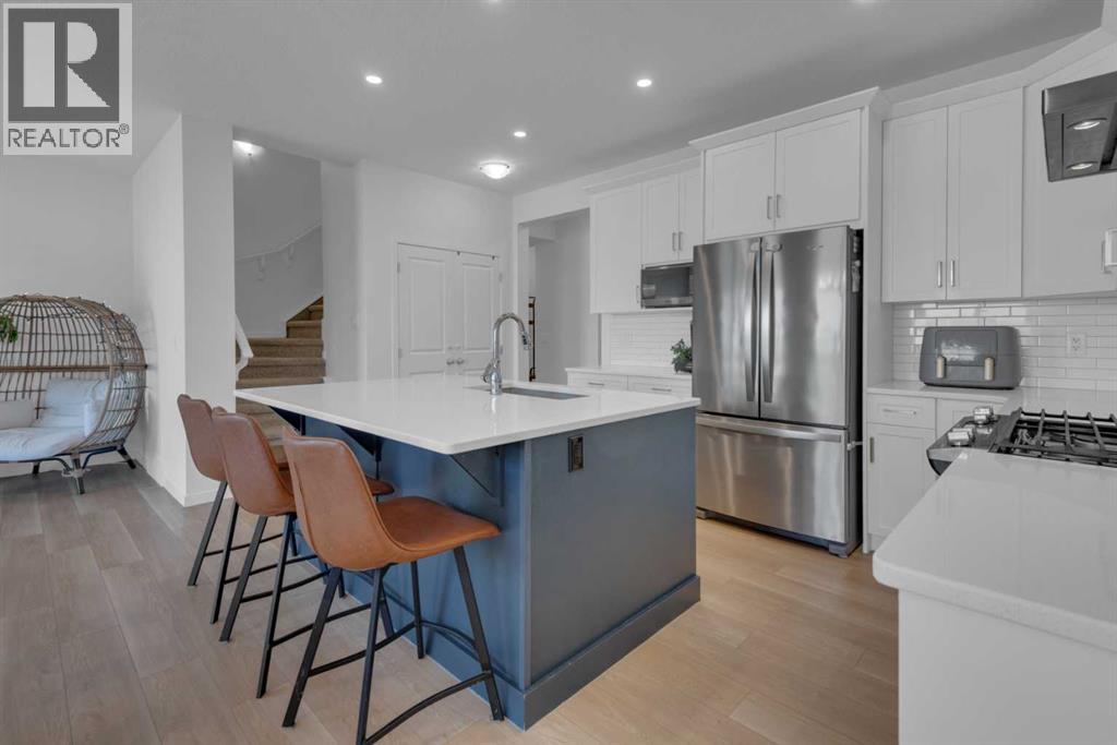 76 Carringsby Avenue NW, Calgary, Alberta  T3P 1R9 - Photo 8 - A2306781