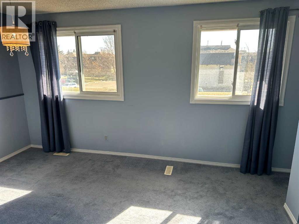 100, 740 Bracewood Drive Sw, Calgary, Alberta  T2W 3N3 - Photo 17 - A2305600