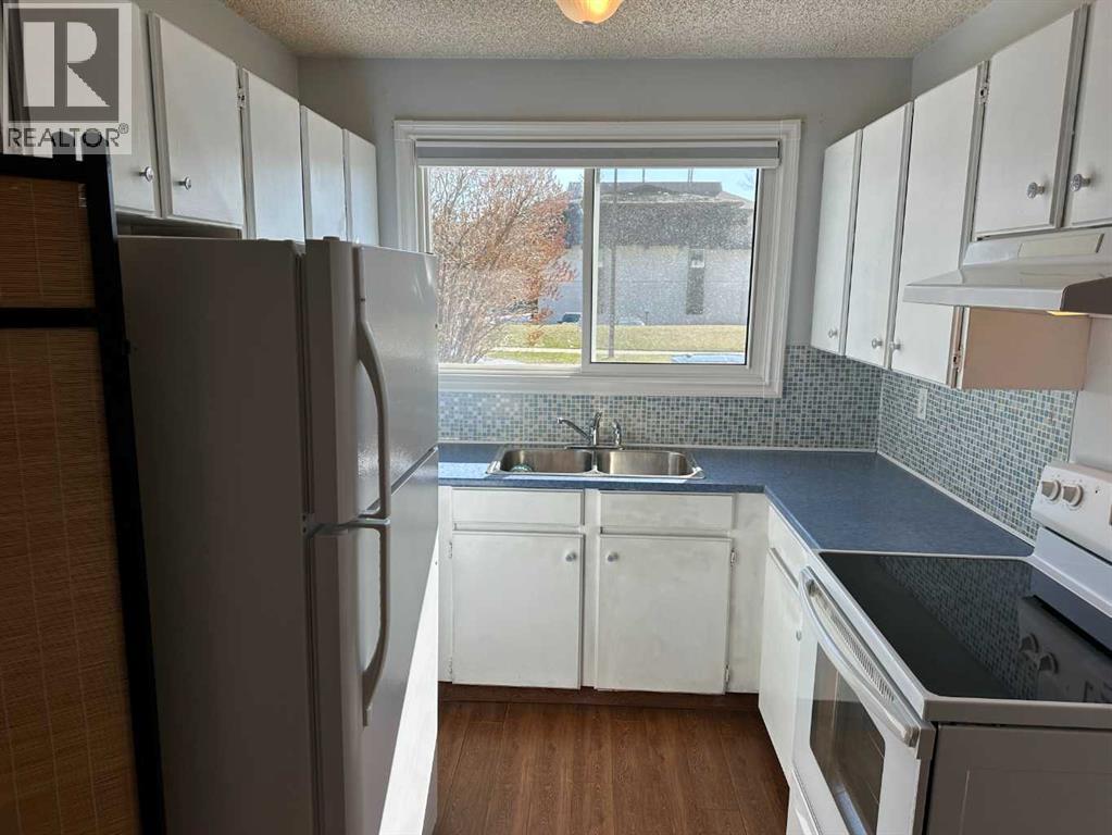 100, 740 Bracewood Drive Sw, Calgary, Alberta  T2W 3N3 - Photo 11 - A2305600