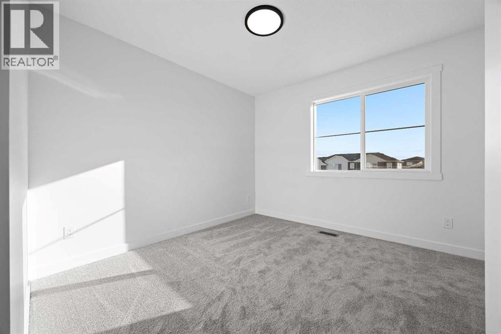 2226 Bayview Drive Sw, Airdrie, Alberta  T4B 5N4 - Photo 31 - A2289337