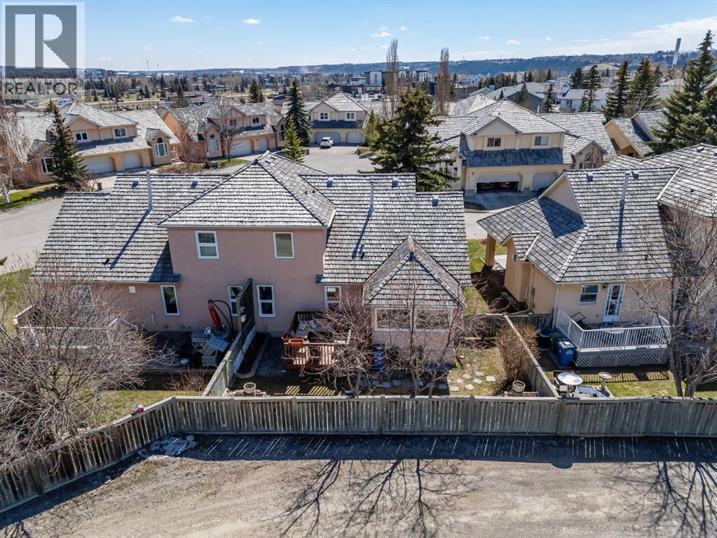 7, 26 Quigley Drive, Cochrane, Alberta  T4C 1M2 - Photo 40 - A2299032