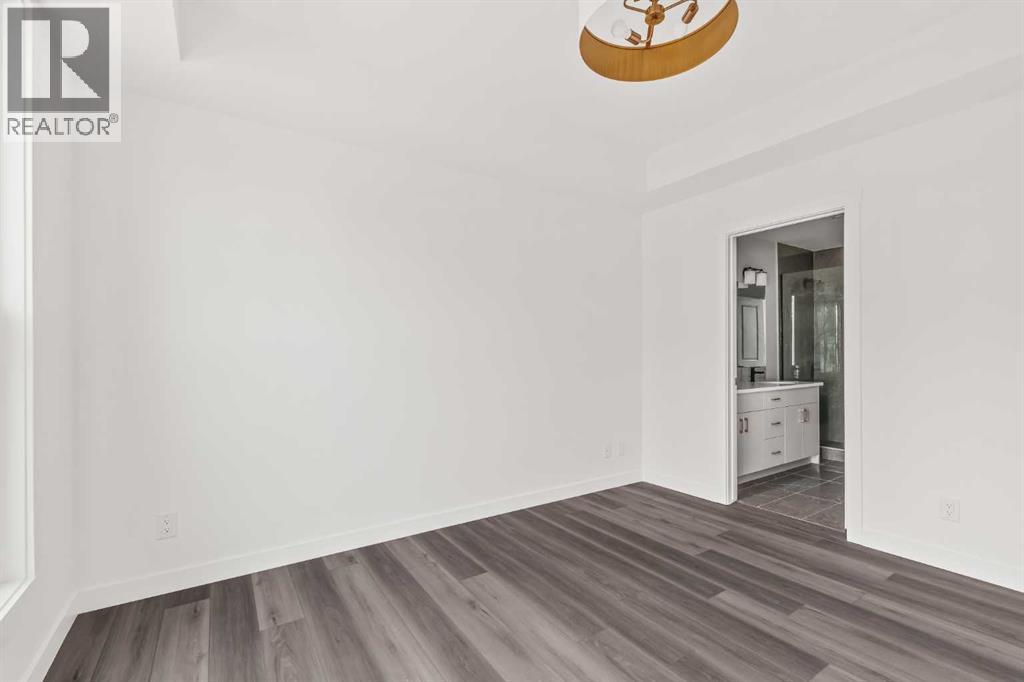 605 Sovereign Common SW, Calgary, Alberta  T3C 3Y3 - Photo 18 - A2298259