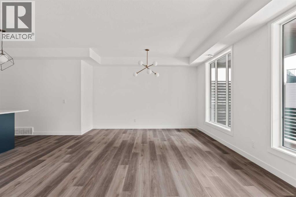 605 Sovereign Common SW, Calgary, Alberta  T3C 3Y3 - Photo 4 - A2298259