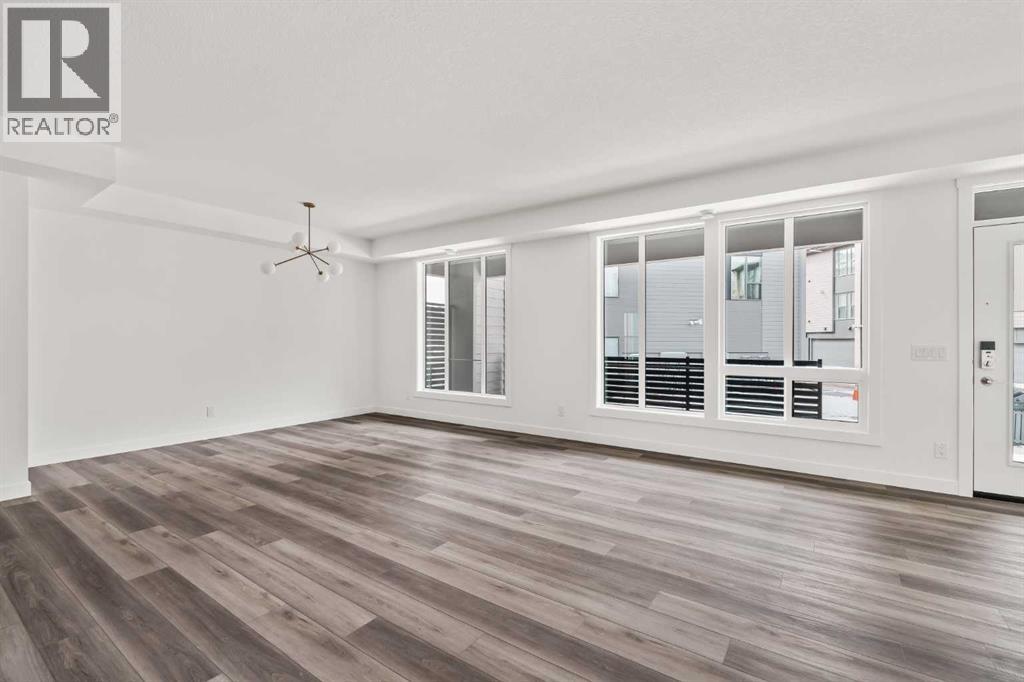 605 Sovereign Common SW, Calgary, Alberta  T3C 3Y3 - Photo 5 - A2298259