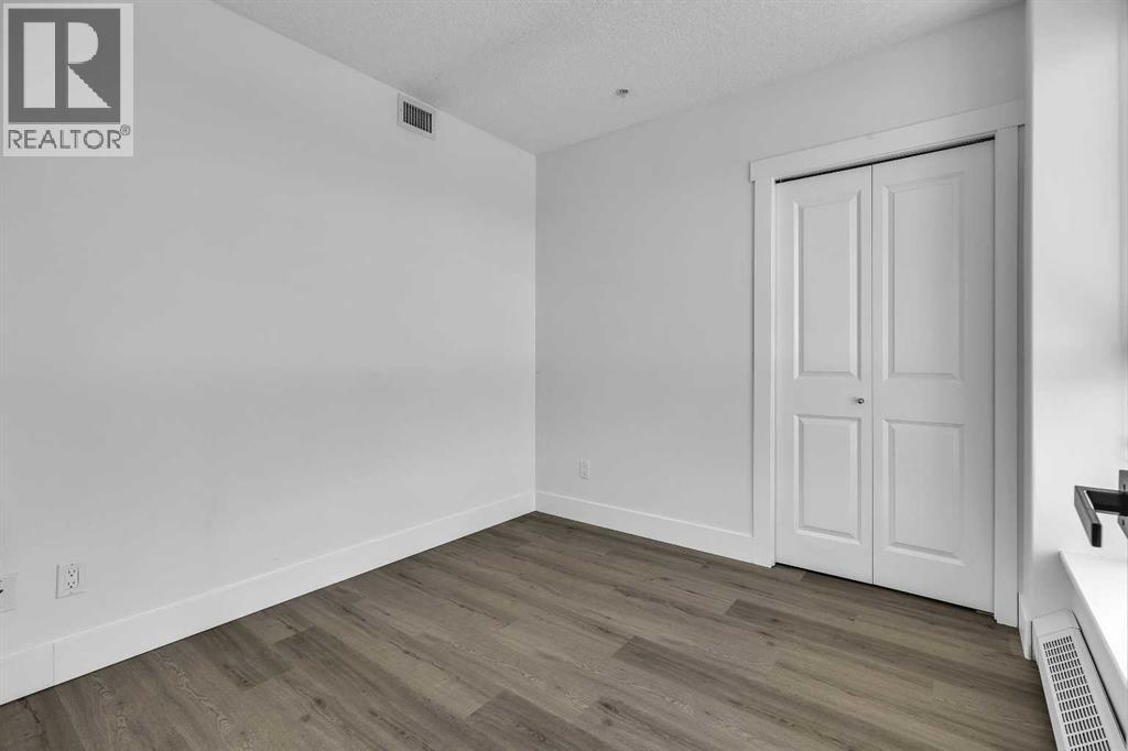 2004, 77 Spruce Place SW, Calgary, Alberta  T3C 3X6 - Photo 18 - A2286192
