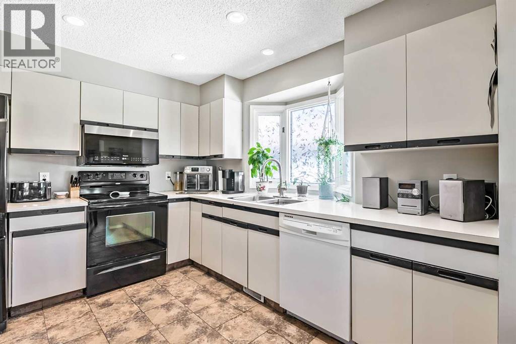 294 Shawnessy Drive Sw, Calgary, Alberta  T2Y 1M5 - Photo 11 - A2305251
