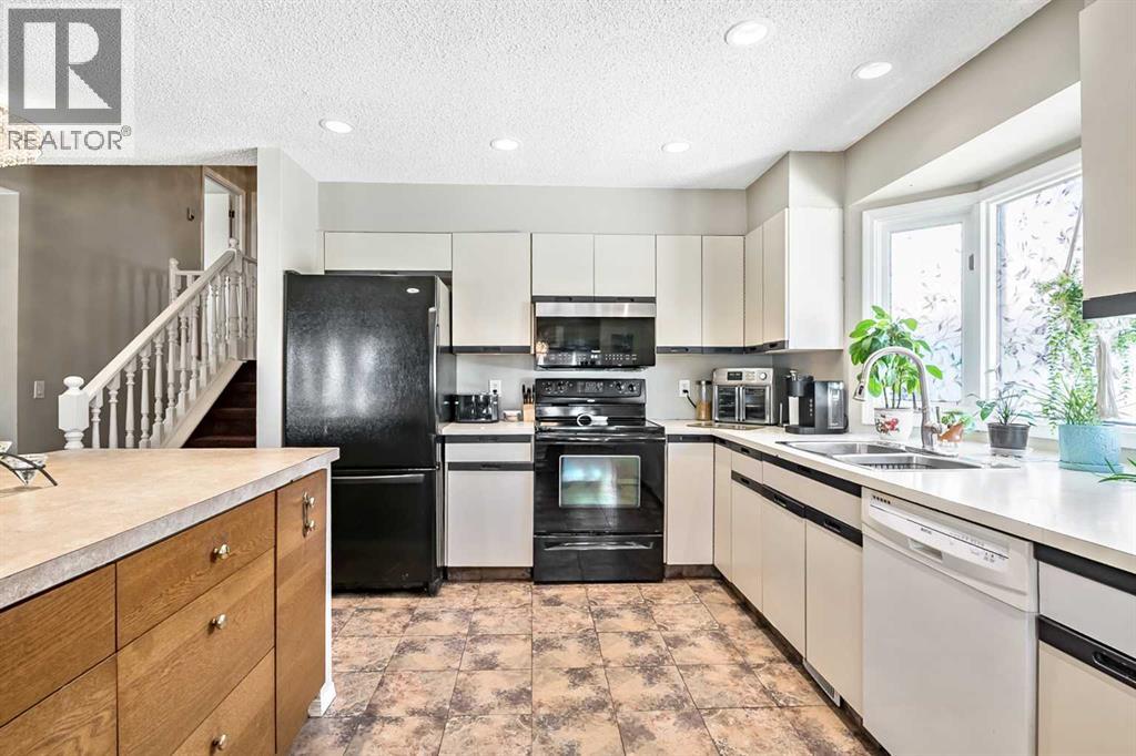 294 Shawnessy Drive Sw, Calgary, Alberta  T2Y 1M5 - Photo 10 - A2305251