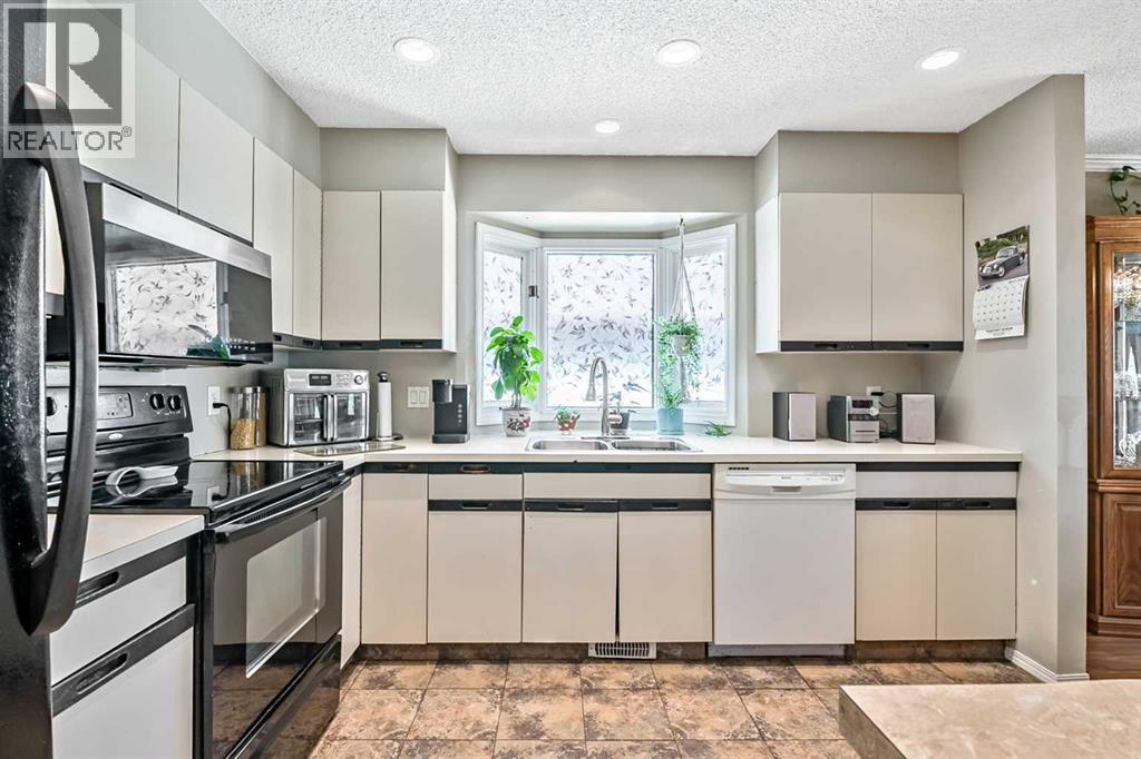294 Shawnessy Drive Sw, Calgary, Alberta  T2Y 1M5 - Photo 9 - A2305251