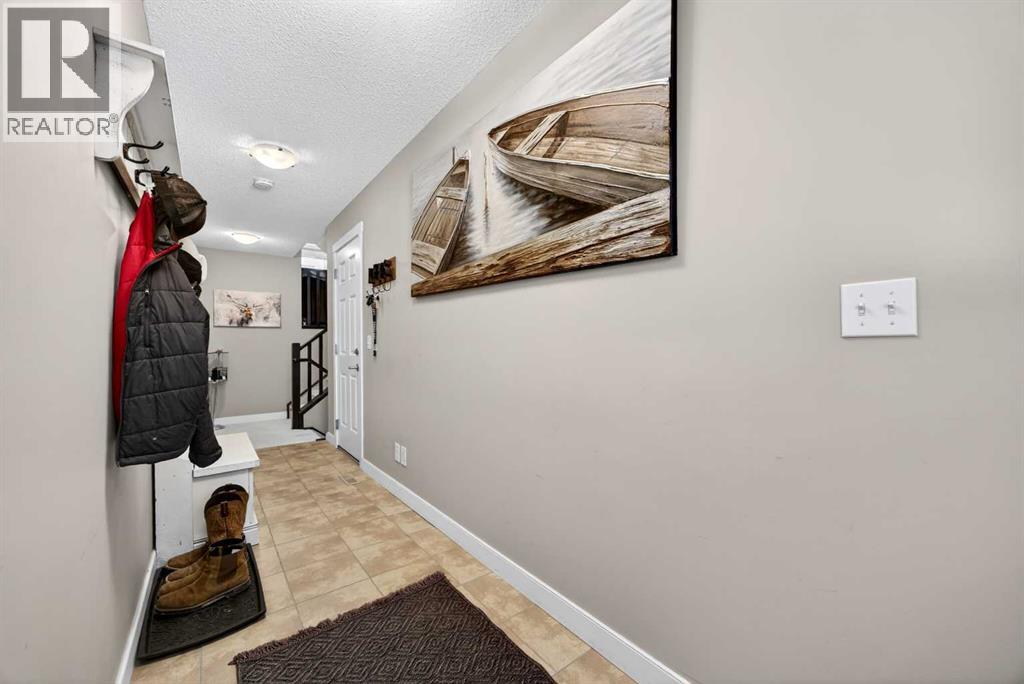 115, 28 Heritage Drive, Cochrane, Alberta  T4C 0K1 - Photo 2 - A2306788
