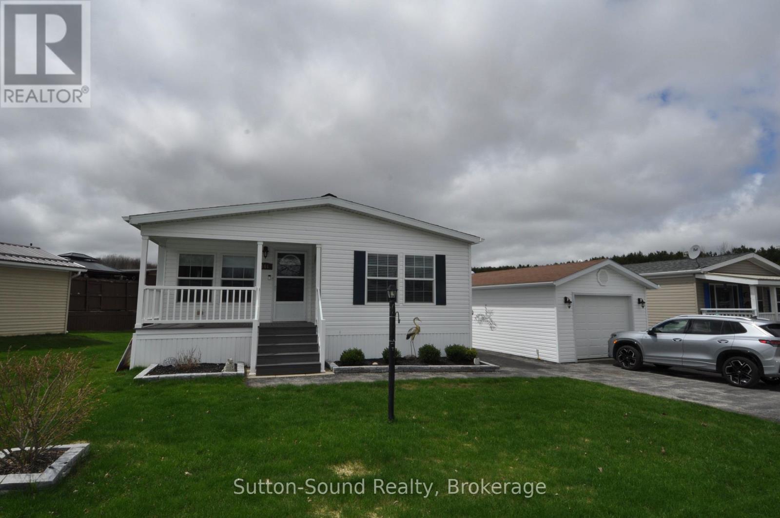 144 Rosewood Drive, Georgian Bluffs, Ontario  N4K 5N5 - Photo 2 - X12655698