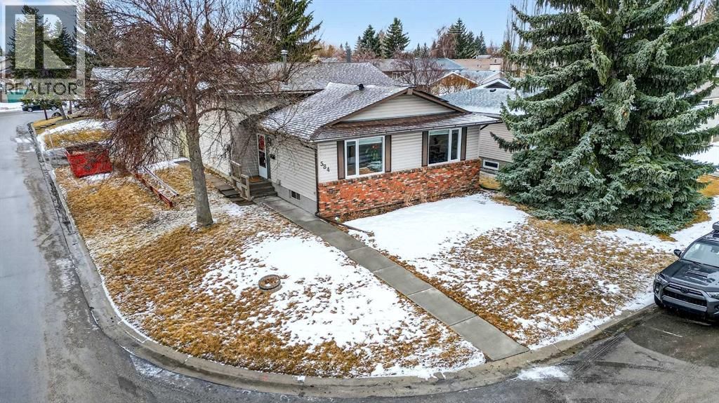 584 Woodhill Place Sw, Calgary, Alberta  T2W 3L5 - Photo 1 - A2298867