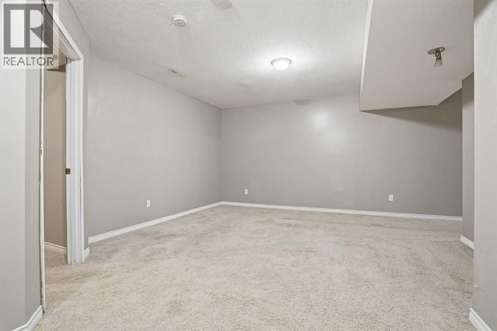 202 New Brighton Manor Se, Calgary, Alberta  T2Z 4J4 - Photo 40 - A2306864