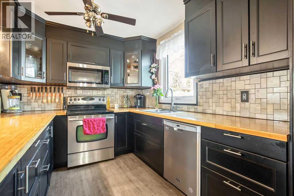 194 Abergale Close Ne, Calgary, Alberta  T2A 6J1 - Photo 6 - A2306624