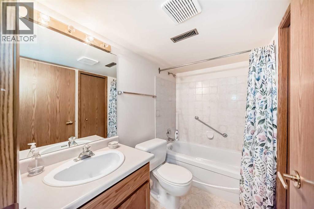16 Vandoos Gardens NW, Calgary, Alberta  T3A 4W4 - Photo 31 - A2306966