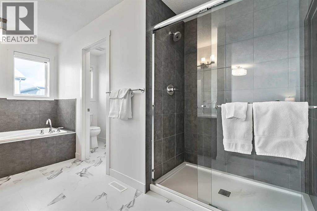 882 Bluerock Way Sw, Calgary, Alberta  T2Y 0S5 - Photo 25 - A2293006