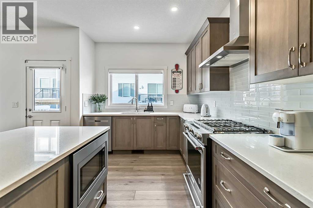882 Bluerock Way Sw, Calgary, Alberta  T2Y 0S5 - Photo 11 - A2293006