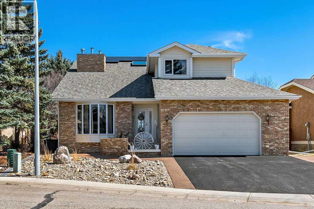 162 Woodbend Way, Okotoks, Alberta  T1S 1M1 - Photo 1 - A2287796