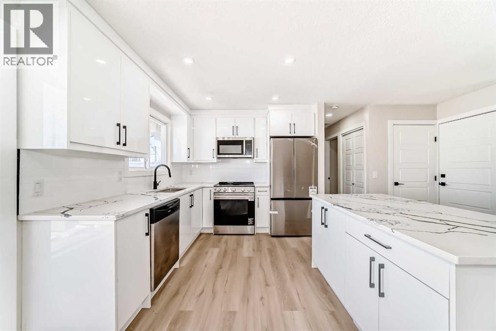 6128 Madigan Drive NE, Calgary, Alberta  T2A 4V8 - Photo 5 - A2281919