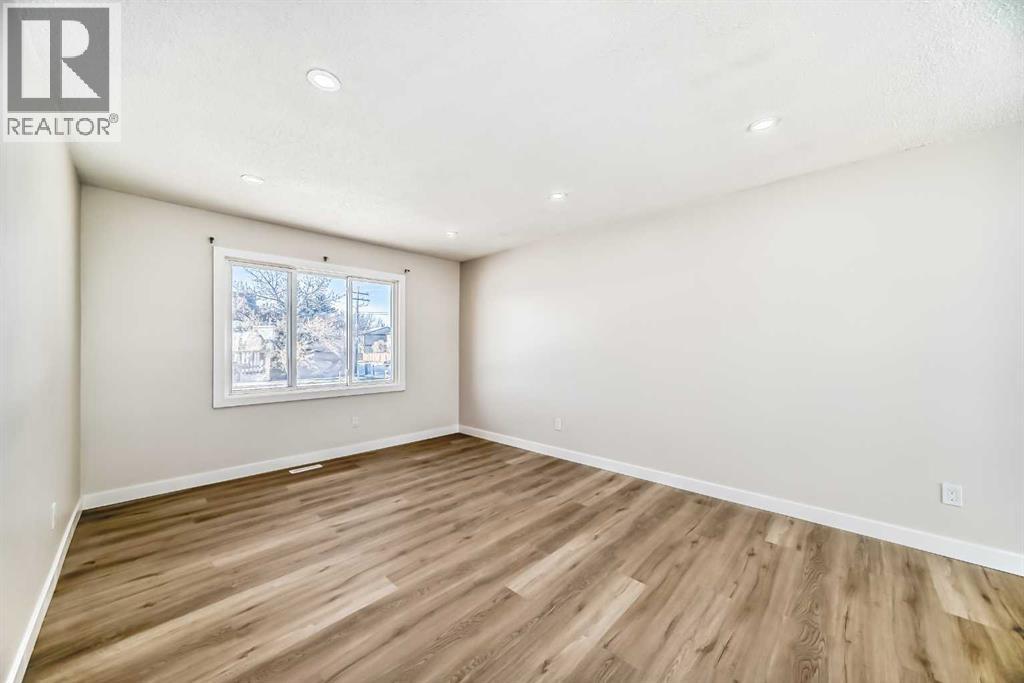 6128 Madigan Drive NE, Calgary, Alberta  T2A 4V8 - Photo 12 - A2281919