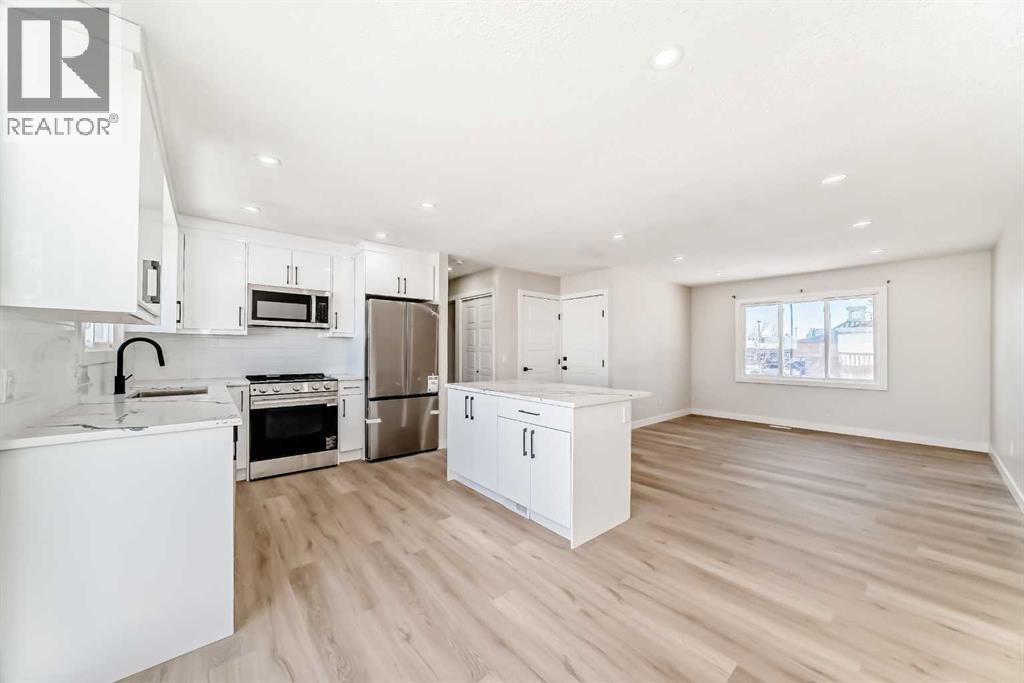 6128 Madigan Drive NE, Calgary, Alberta  T2A 4V8 - Photo 9 - A2281919