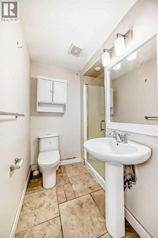 6128 Madigan Drive NE, Calgary, Alberta  T2A 4V8 - Photo 32 - A2281919