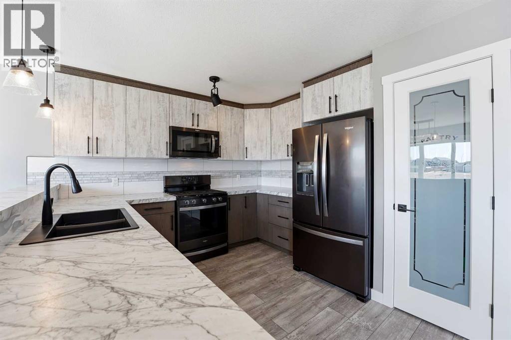 11 Aura Drive, Blackfalds, Alberta  T4M 0N3 - Photo 4 - A2306018