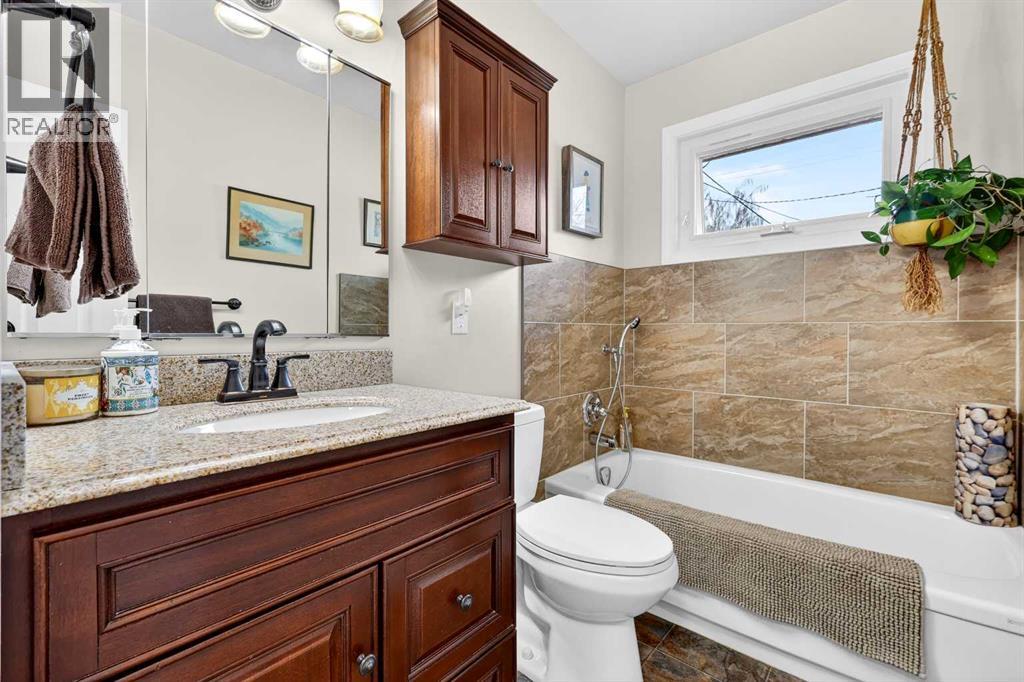 1415 108 Avenue SW, Calgary, Alberta  T2W 0C6 - Photo 20 - A2303870