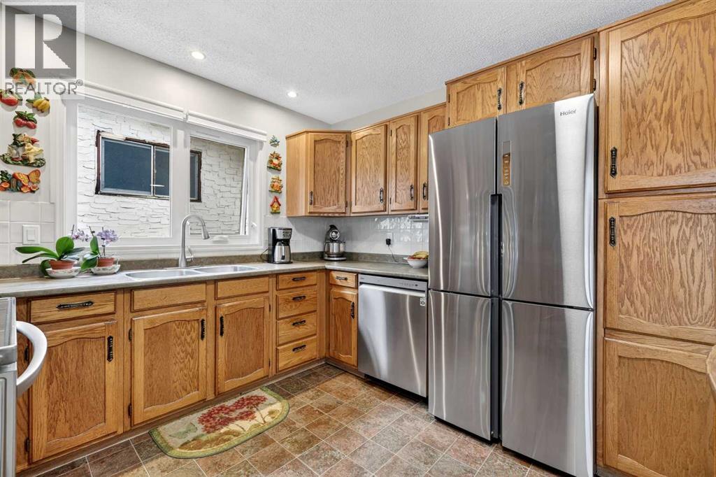 1415 108 Avenue SW, Calgary, Alberta  T2W 0C6 - Photo 10 - A2303870