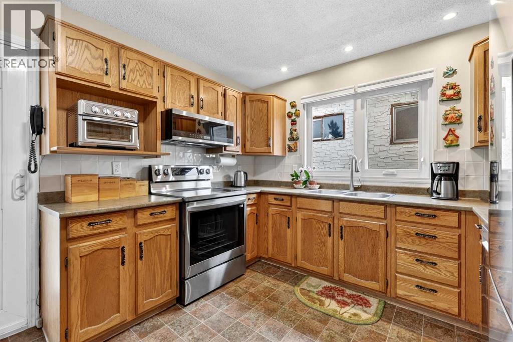 1415 108 Avenue SW, Calgary, Alberta  T2W 0C6 - Photo 9 - A2303870