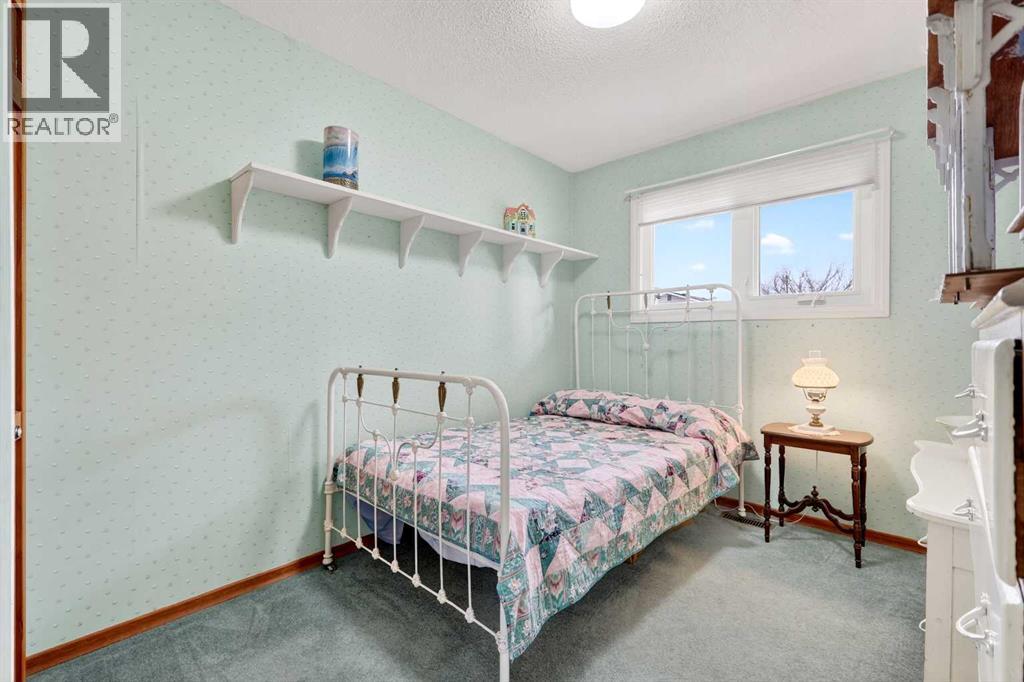 1415 108 Avenue SW, Calgary, Alberta  T2W 0C6 - Photo 21 - A2303870