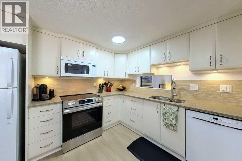 425, 3131 63 Avenue Sw, Calgary, Alberta  T3E 6N4 - Photo 5 - A2307246