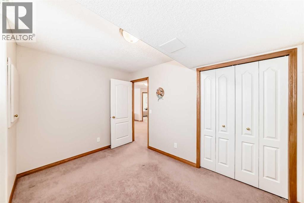 220 Rocky Ridge Villas Nw, Calgary, Alberta  T3G 4R3 - Photo 37 - A2297086