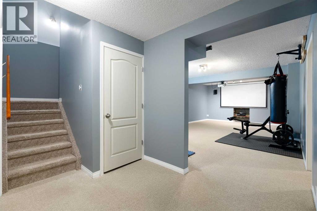 142 Coopers Bay Sw, Airdrie, Alberta  T4B 3K2 - Photo 31 - A2306925
