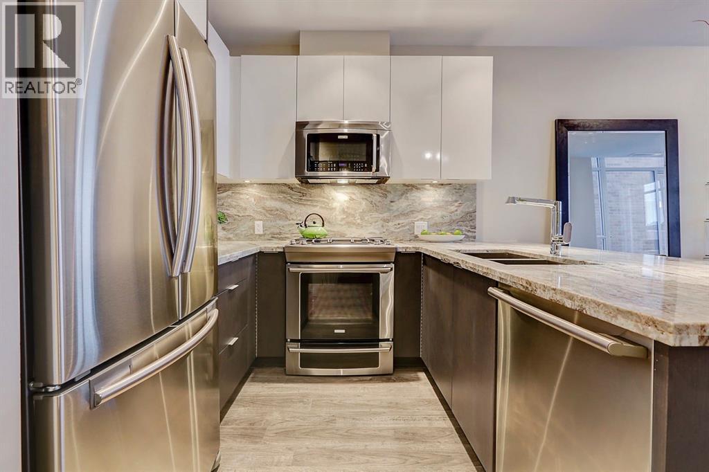 119 Confluence Mews SE, Calgary, Alberta  T2G 1J1 - Photo 7 - A2304002