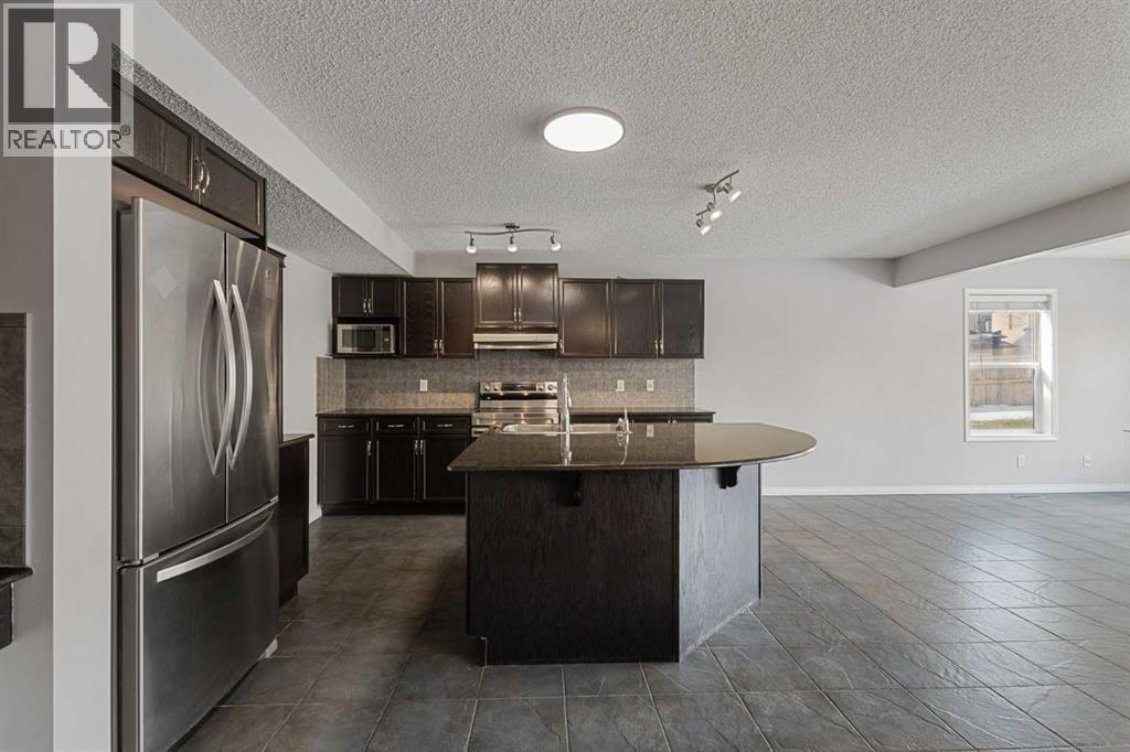 72 Pantego Close NW, Calgary, Alberta  T3K 0K1 - Photo 10 - A2307103