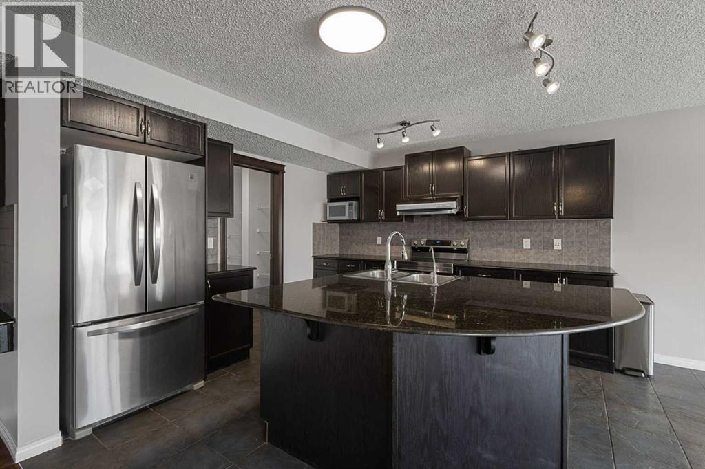 72 Pantego Close NW, Calgary, Alberta  T3K 0K1 - Photo 11 - A2307103