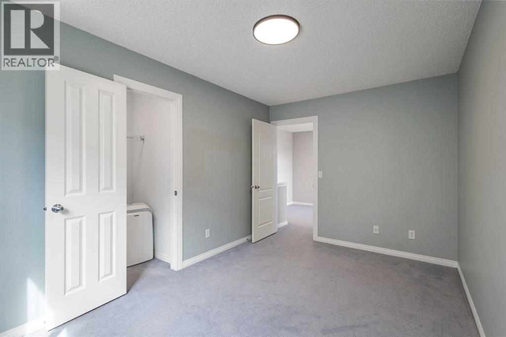 72 Pantego Close NW, Calgary, Alberta  T3K 0K1 - Photo 27 - A2307103