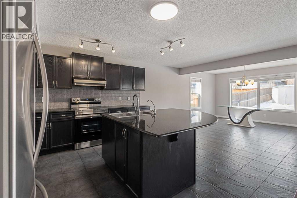 72 Pantego Close NW, Calgary, Alberta  T3K 0K1 - Photo 8 - A2307103