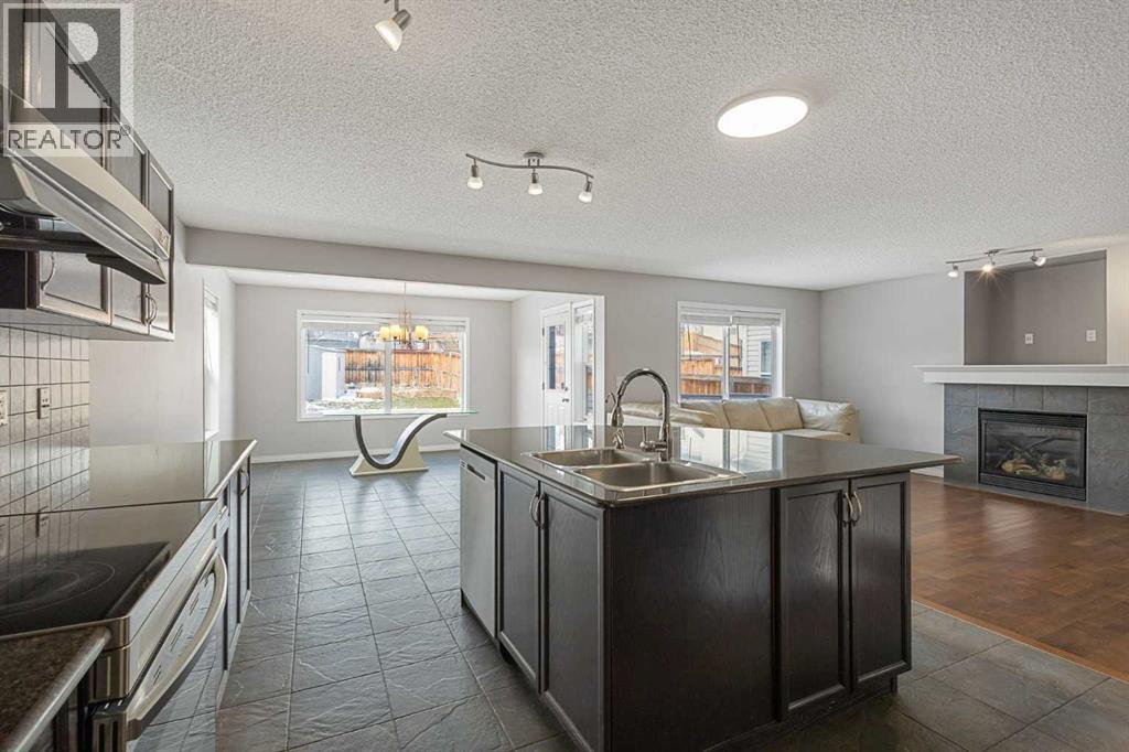 72 Pantego Close NW, Calgary, Alberta  T3K 0K1 - Photo 9 - A2307103