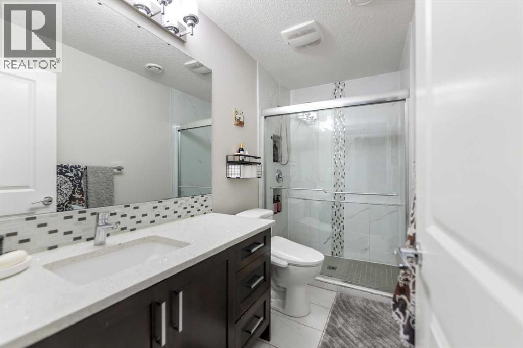 125 Kinniburgh Loop, Chestermere, Alberta  T1X 0T9 - Photo 46 - A2307271