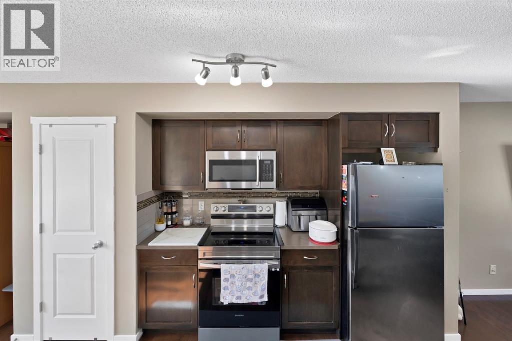108 Panamount Way NW, Calgary, Alberta  T3K 0P7 - Photo 9 - A2295876