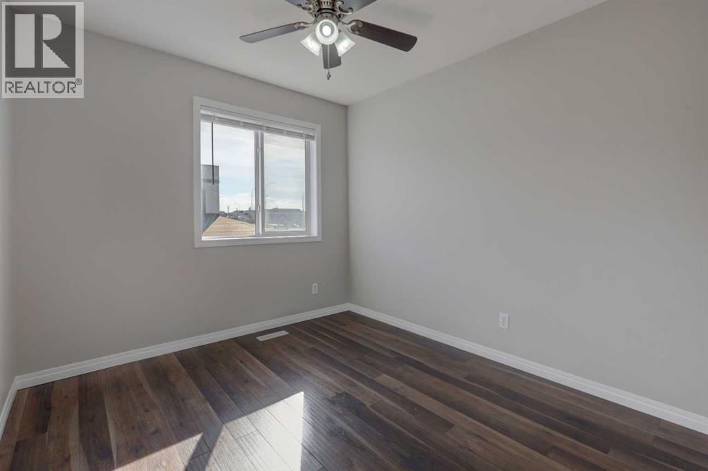 302, 2006 Luxstone Boulevard Sw, Airdrie, Alberta  T4B 3C4 - Photo 20 - A2300510
