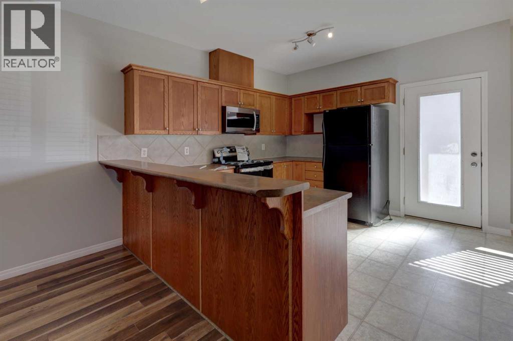 302, 2006 Luxstone Boulevard Sw, Airdrie, Alberta  T4B 3C4 - Photo 9 - A2300510