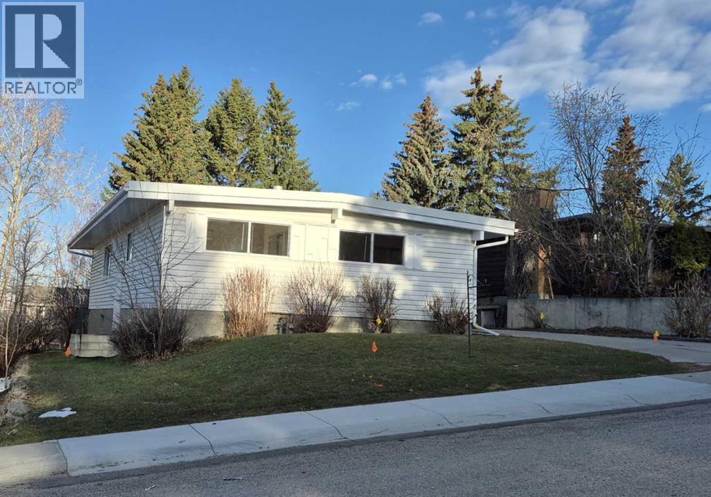 3415 Benton Drive NW, Calgary, Alberta  T2L 1W7 - Photo 2 - A2305111