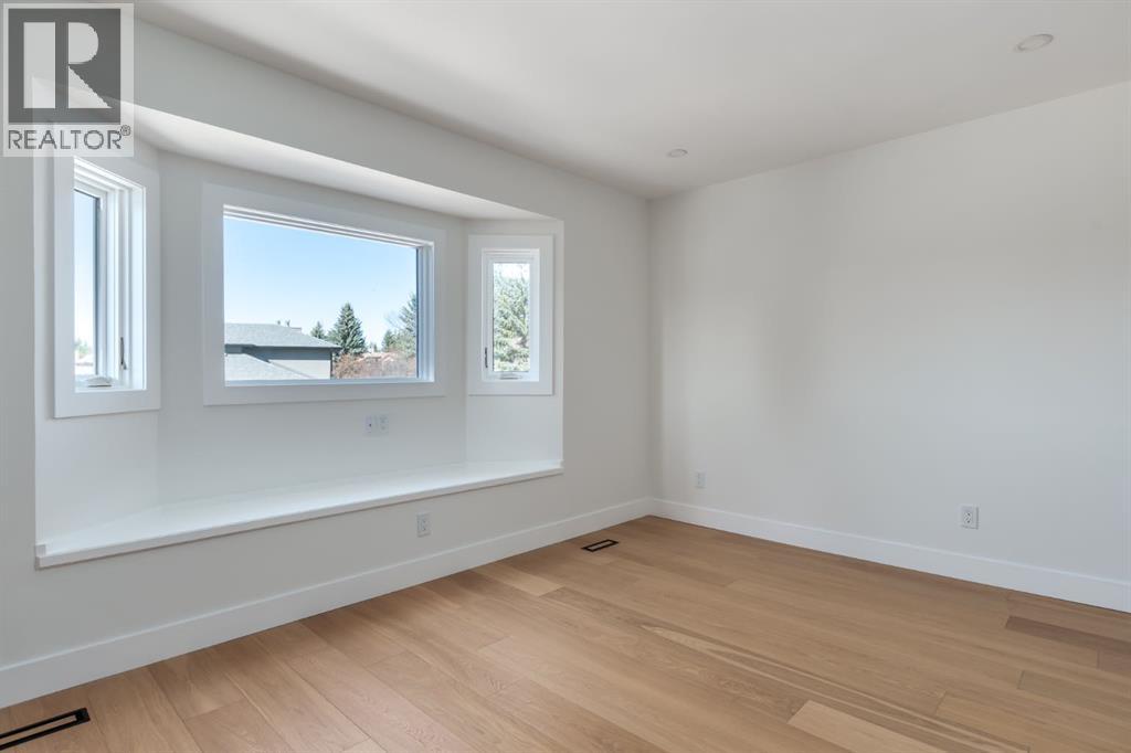 71 Woodridge Close SW, Calgary, Alberta  T2W 5M2 - Photo 32 - A2307237