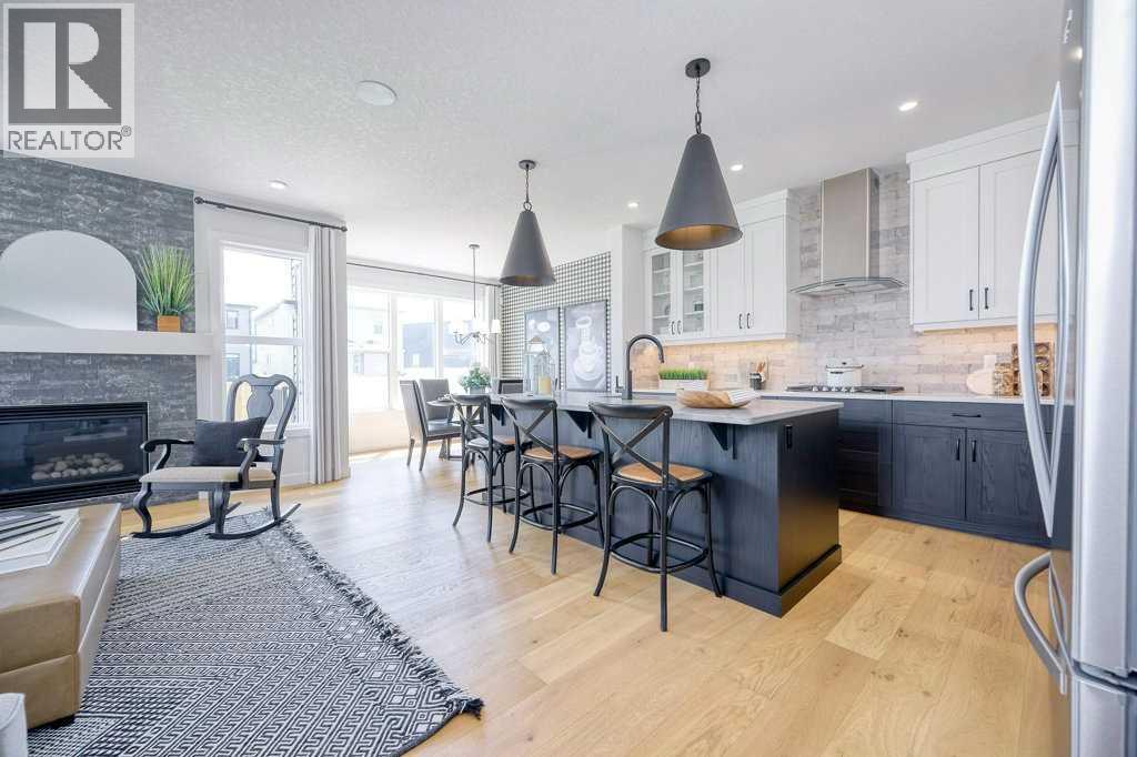 103 Wolf Creek Rise SE, Calgary, Alberta  T2X 4Z2 - Photo 6 - A2275919