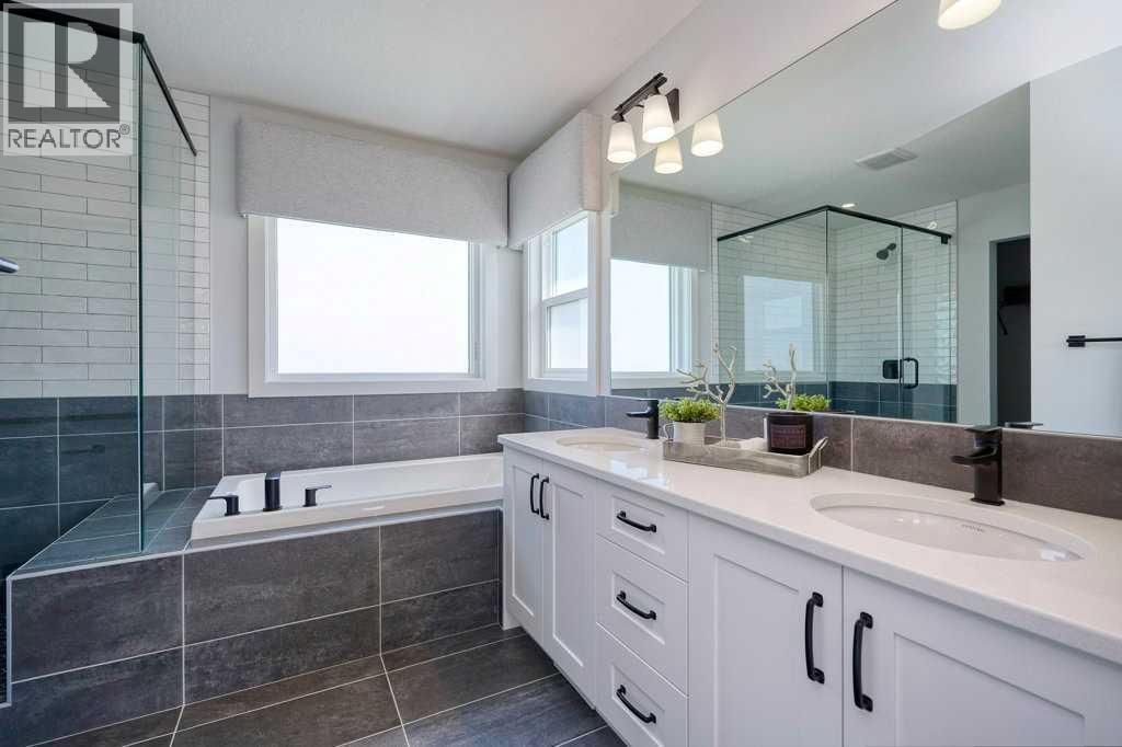 103 Wolf Creek Rise SE, Calgary, Alberta  T2X 4Z2 - Photo 26 - A2275919