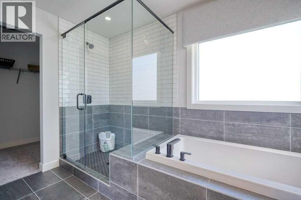 103 Wolf Creek Rise SE, Calgary, Alberta  T2X 4Z2 - Photo 27 - A2275919